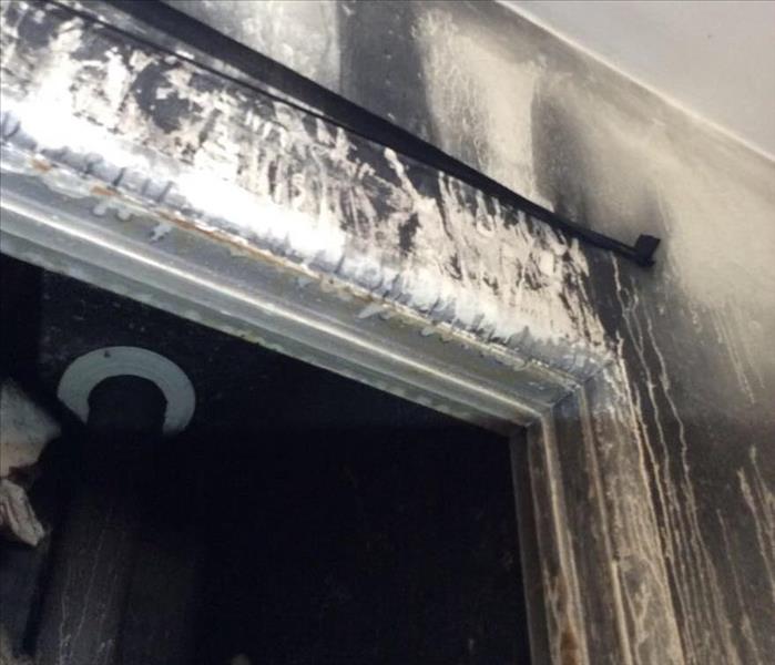 Soot damages on drywall and closet